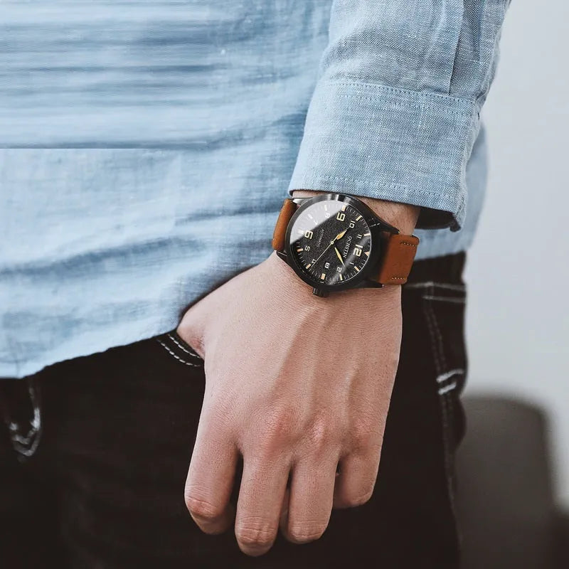 Men's automatic mechanical watch with leather strap in business style showing four colour variations