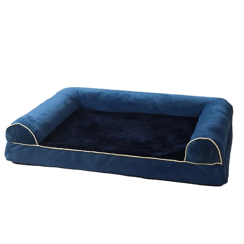 Square dog bed with sponge filling shown in blue colour with dog resting