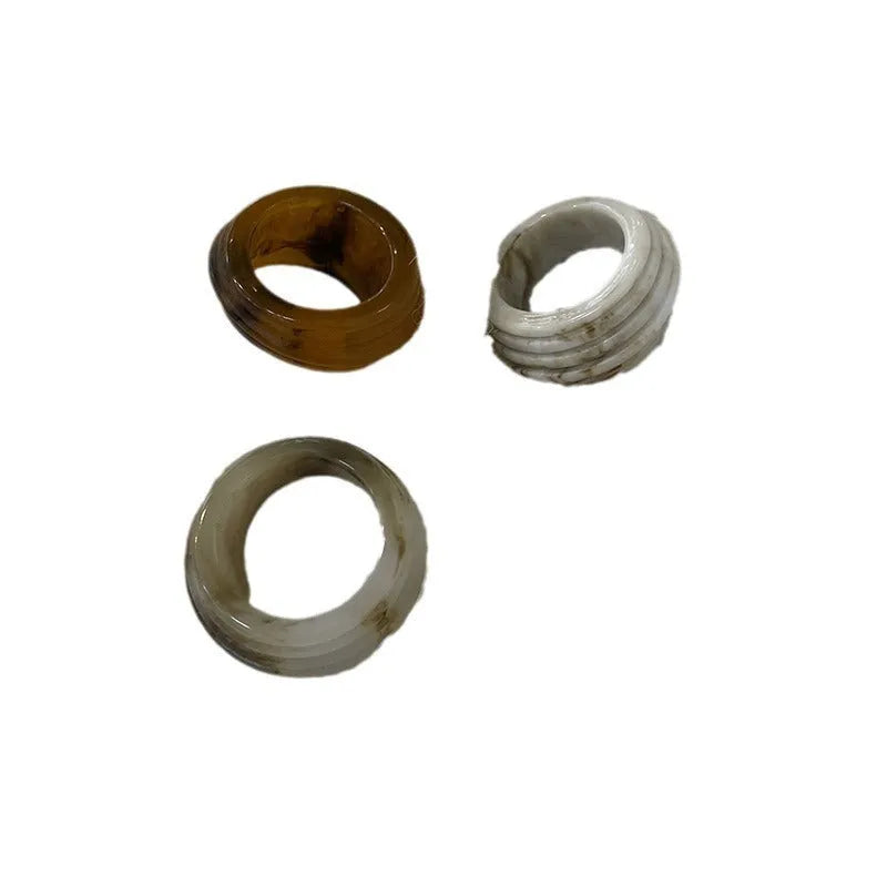 Chinese style irregular geometric resin wide ring in earthy brown and white colour variations