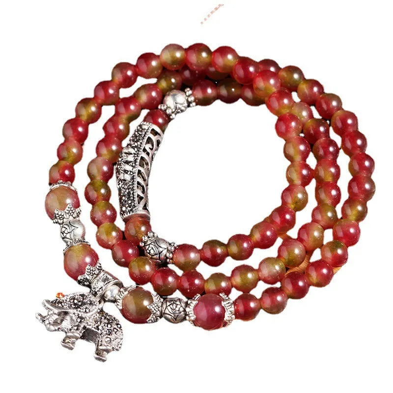 Natural watermelon crystal bracelet with Chinese knot and geometric beads in elephant style