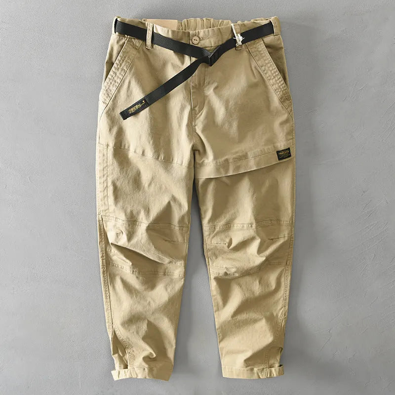 Men's khaki cotton casual overalls with elastic waistband and loose leg fit.