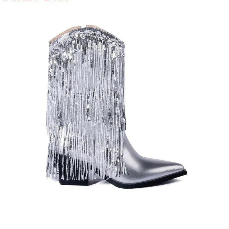 Women's black chunky heel tassel boots with a pointed toe and a high stiletto heel.