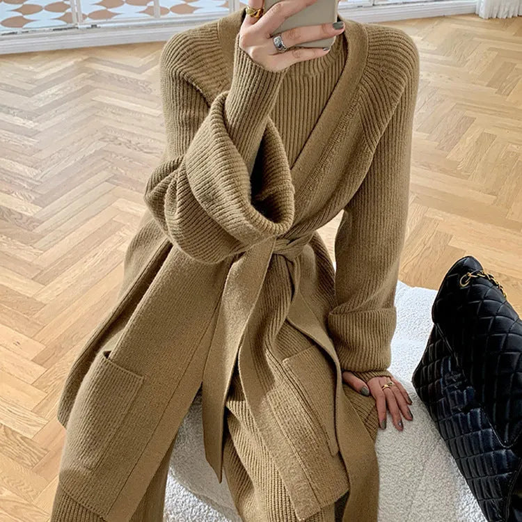 Women's apricot knitted three-piece set showing top, cardigan, and wide-leg trousers with leather stitching detail.