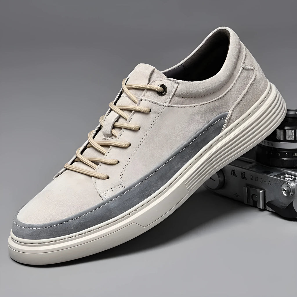 Men's grey casual leather skate shoes with round toe and lace-up front.