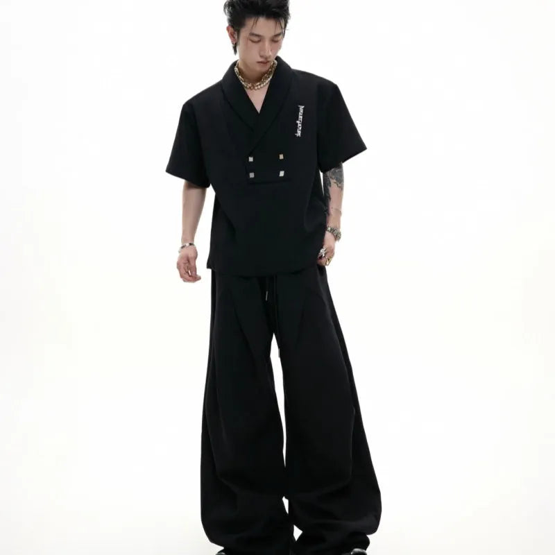 Men's two-piece metal embellished cotton sports suit with padded shoulders and matching shorts