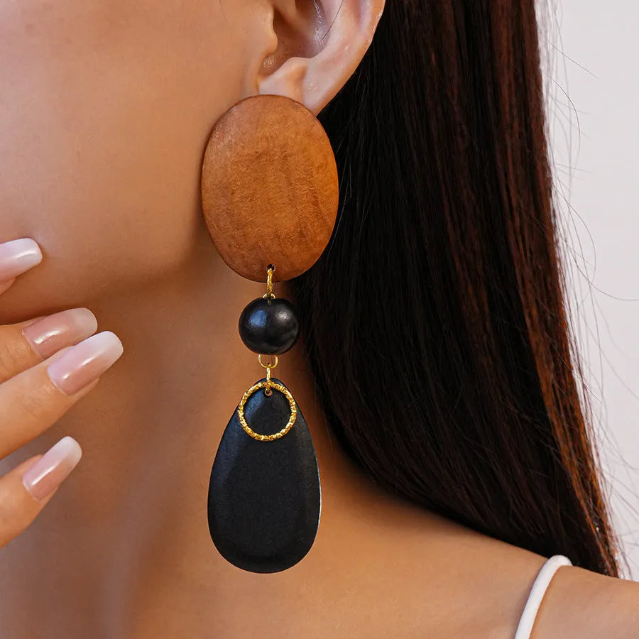 Wooden earrings with elliptical design in silver needle-brown-black colour scheme