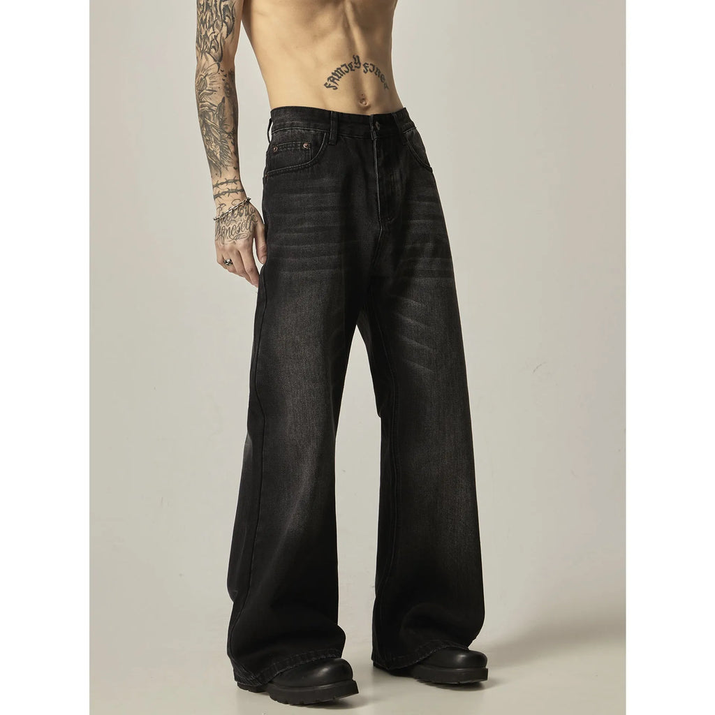 Black loose straight-leg jeans with retro styling and zipper fly