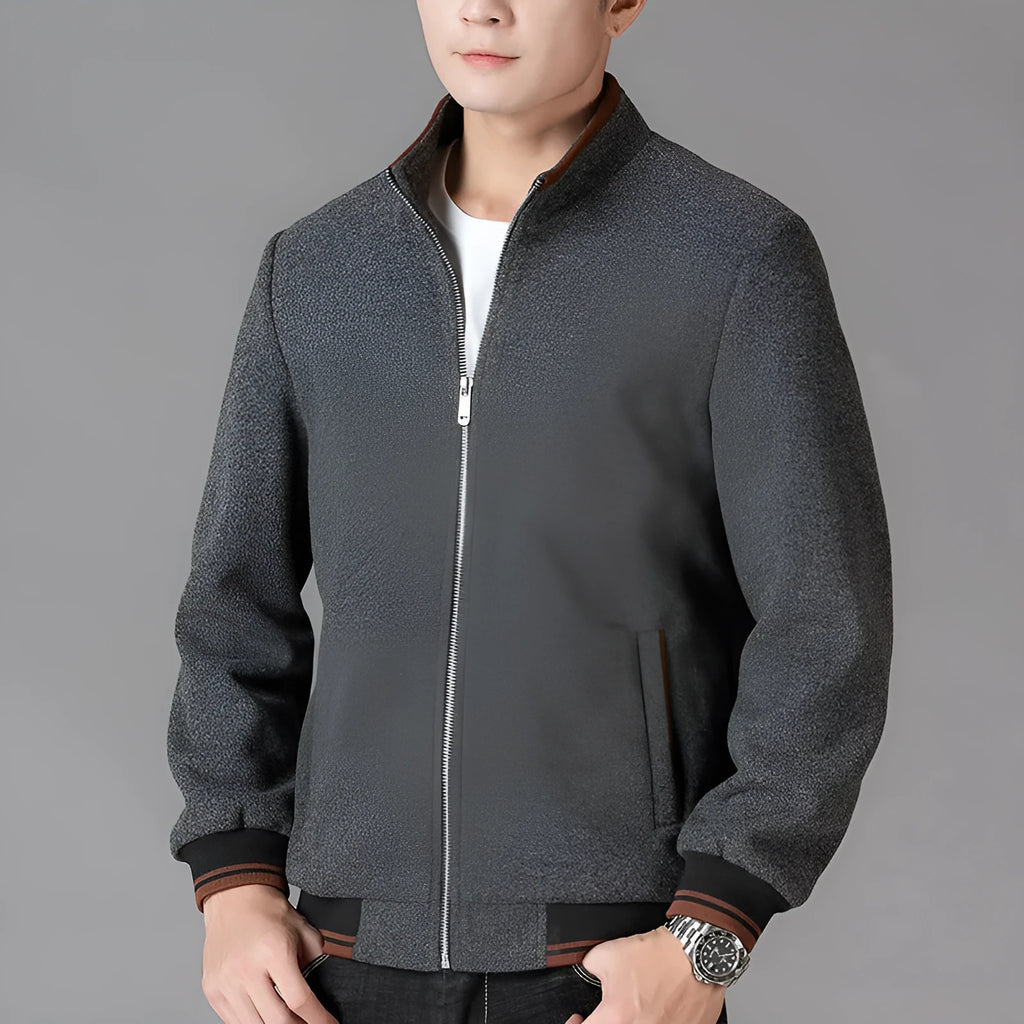Men's grey sport-style fleece jacket with long sleeves on a hanger
