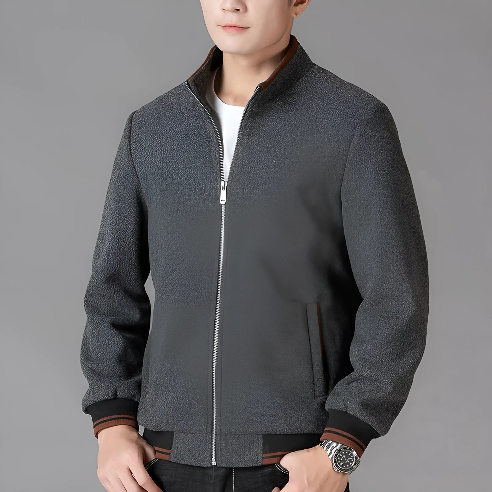 Men's grey sport-style fleece jacket with long sleeves on a hanger