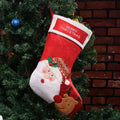 Christmas candy bag non-woven fabric decoration with elk, elderly man, or snowman design for holding stockings.