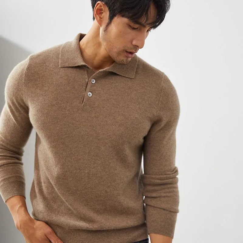 Man wearing a sapphire blue cashmere pullover sweater with a polo collar in a loose fit.