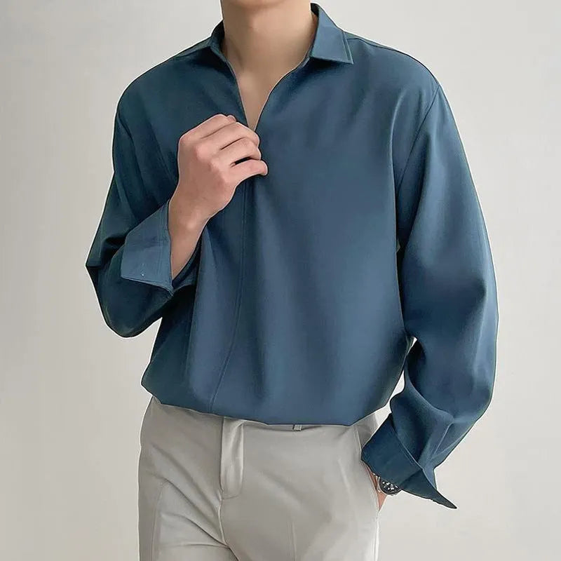 Men's loose lapel casual long sleeve shirt in solid colour on a hanger