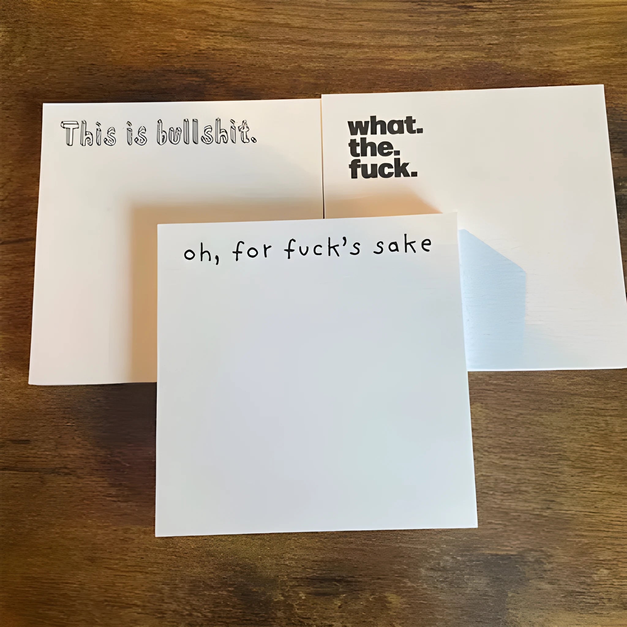 Square 75mm sticky note paper with colourful printed cover designs on white background