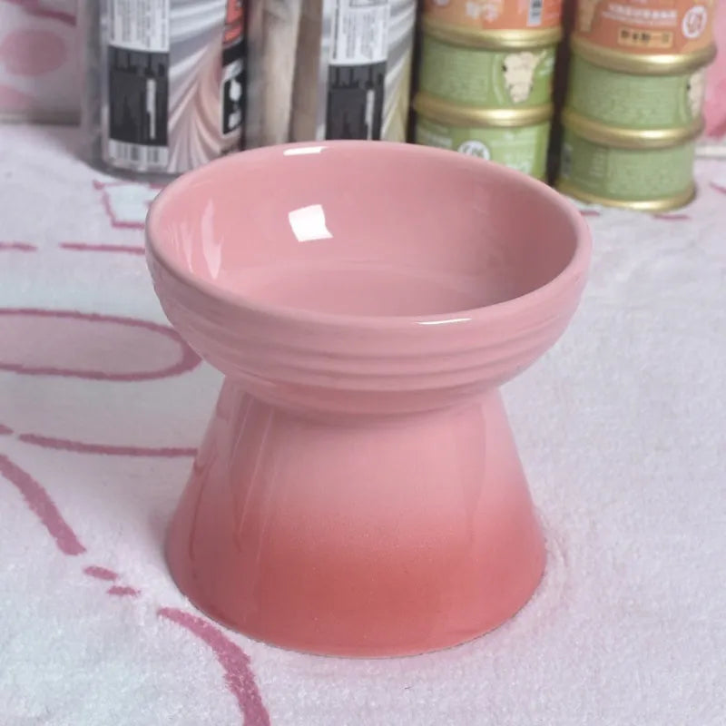 High-foot ceramic pet bowl with chin protector and anti-tumble base design