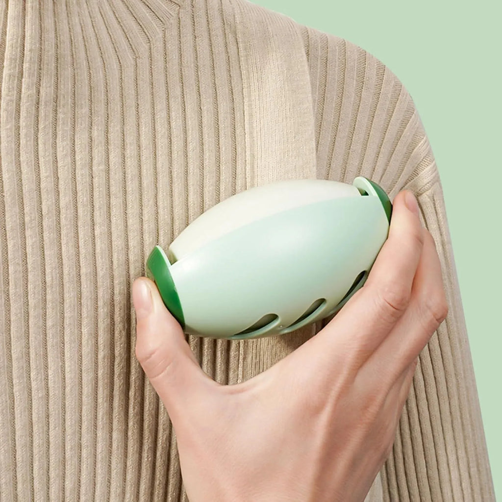 Green washable gel lint roller ball for removing pet hair from fabrics