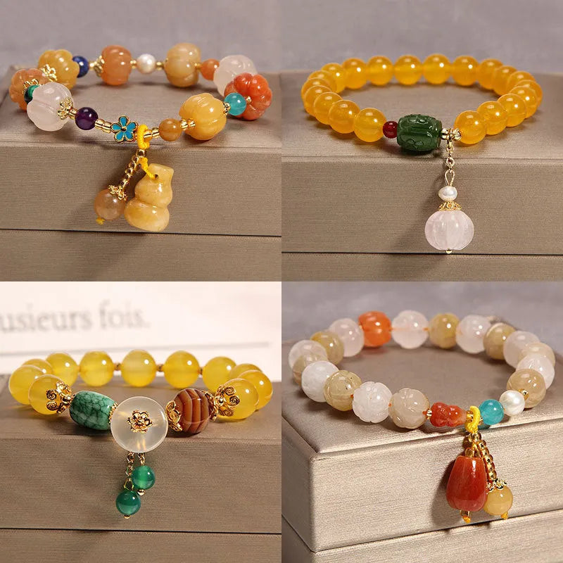 Khaki coloured crystal bead bracelet for women on a gold silk cord, showing Japanese and South Korean style.