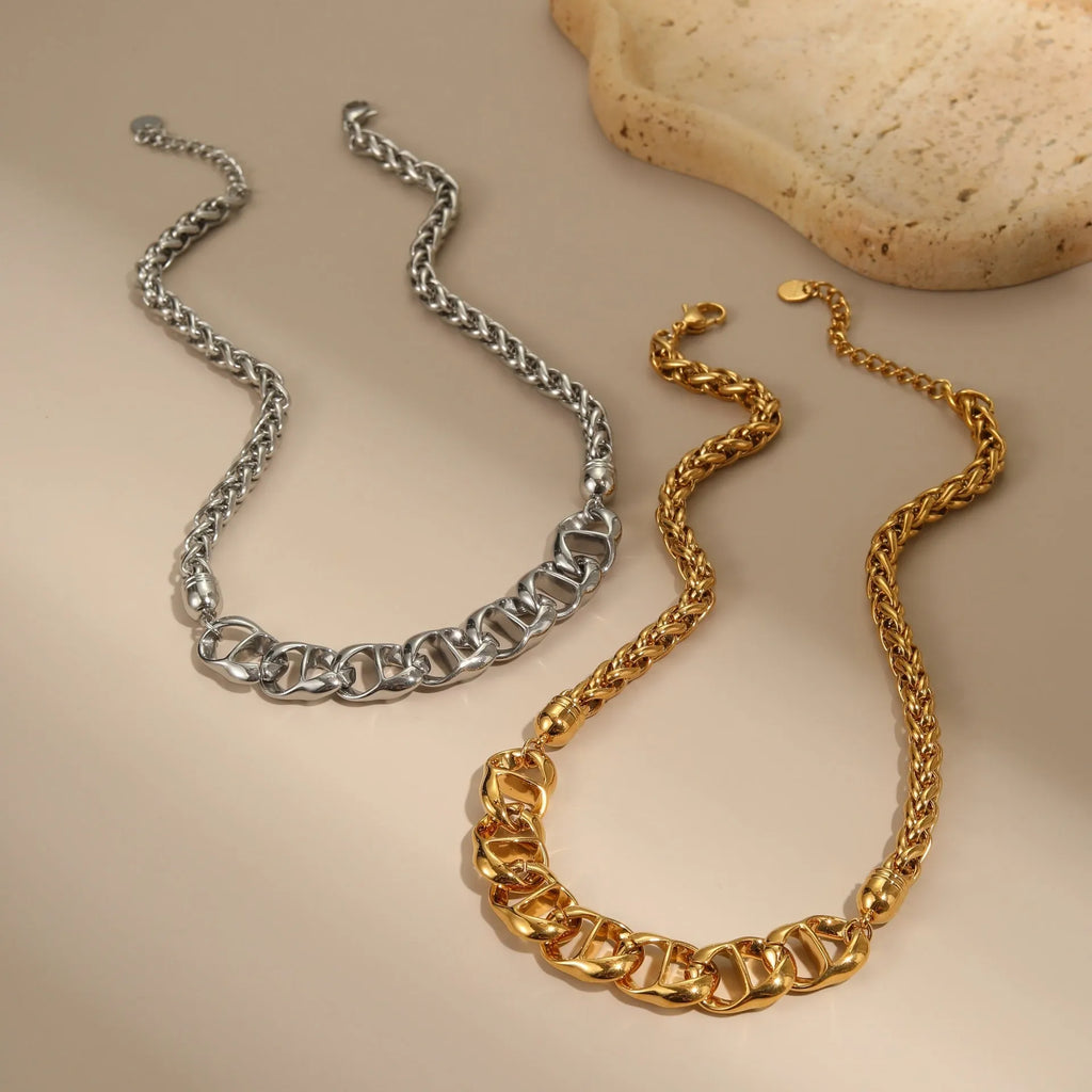Stainless steel necklace with geometric pendant in gold plated or steel colour options