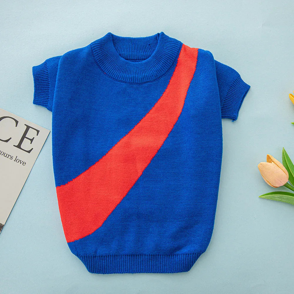 A corgi or poodle wearing a casual-style wool sweater in one of six available colours.