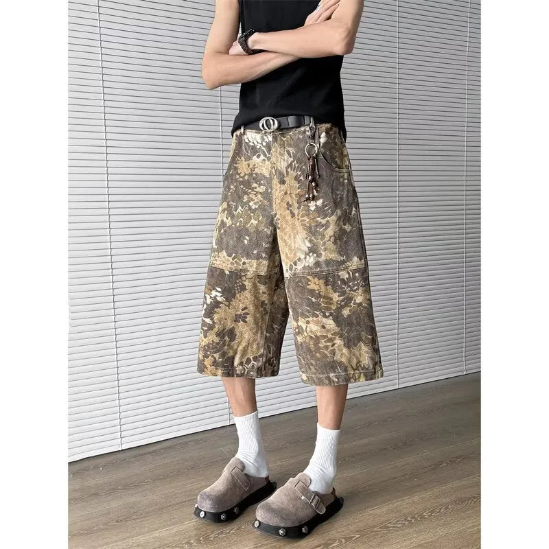 Yellow denim jeans with snake camouflage pattern, cropped length design