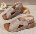 Women's brown Roman platform sandals with skirt detail and Velcro strap on a rubber sole.