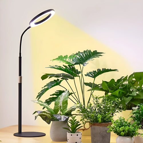 White retractable floor standing plant grow light with angel ring LED panel extended to full height.