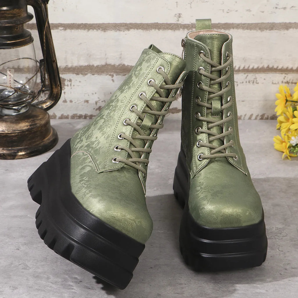 Women's white retro platform boots with patchwork PU upper and chunky rubber sole.