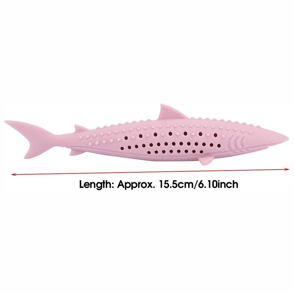 Green silicone fish-shaped cat chew toy with removable parts for catnip, shown on a white background.