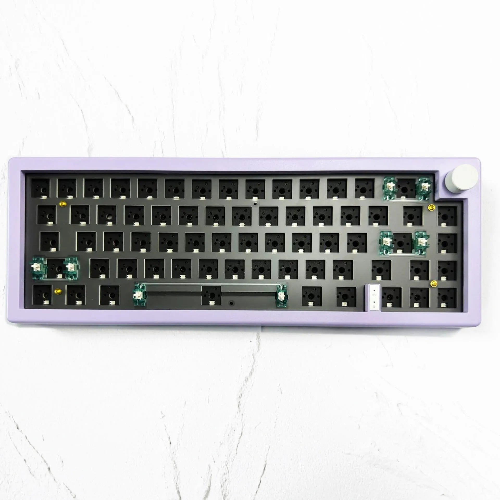 DIY mechanical keyboard kit with RGB lighting and rotary knob in seven colour options