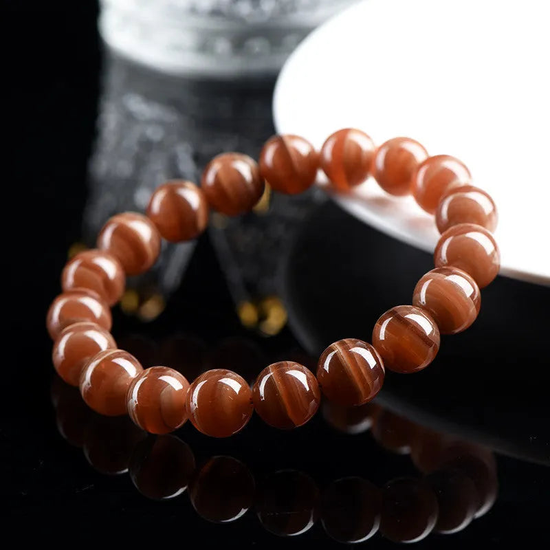 Natural Peruvian rhodochrosite bracelet with round beads in old mine manganese spar colour
