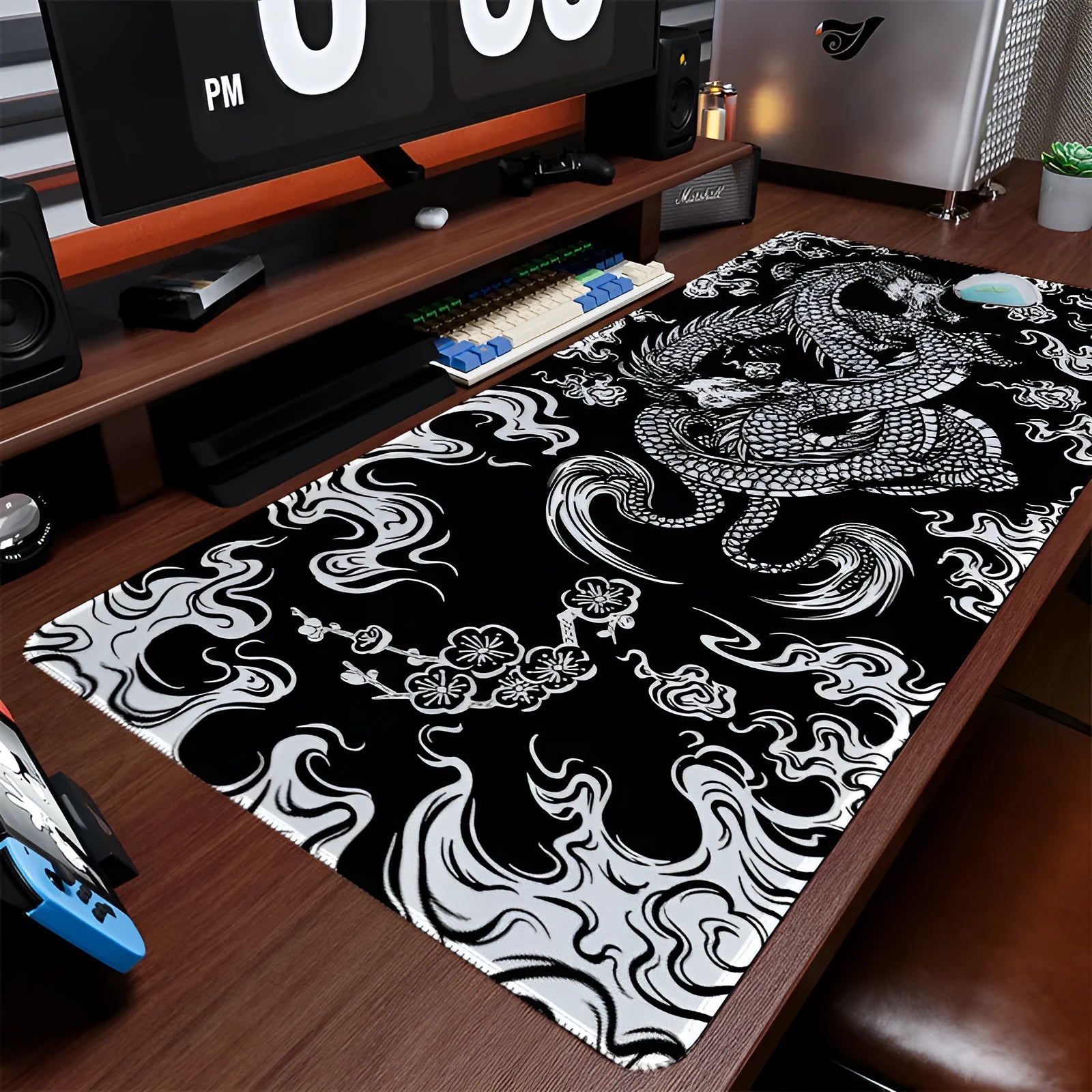 Esports dragon pattern cloth gaming mouse pad on a desk, showing non-slip backing and thermal transfer print detail.