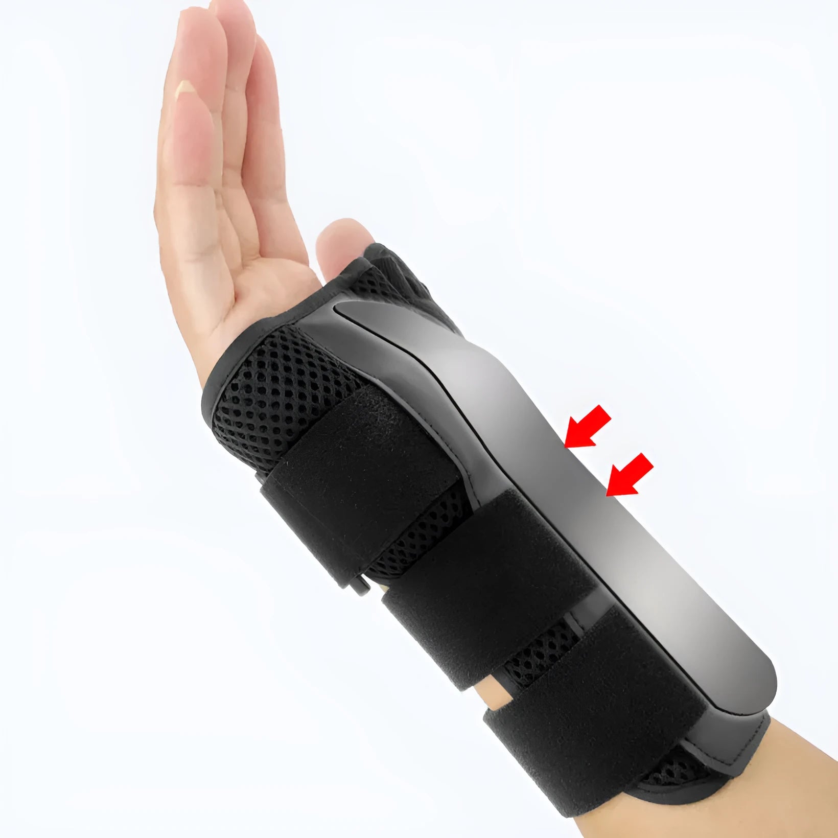 Black carbon fibre pattern wrist guard with grey edging and a white thumb strap, shown on a left hand.