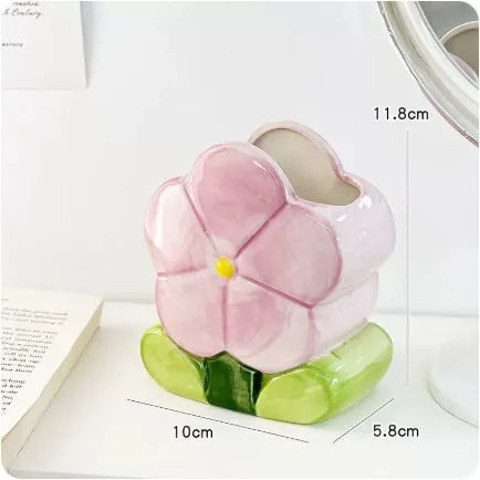Ceramic flower pen holder storage box with floral design on desktop