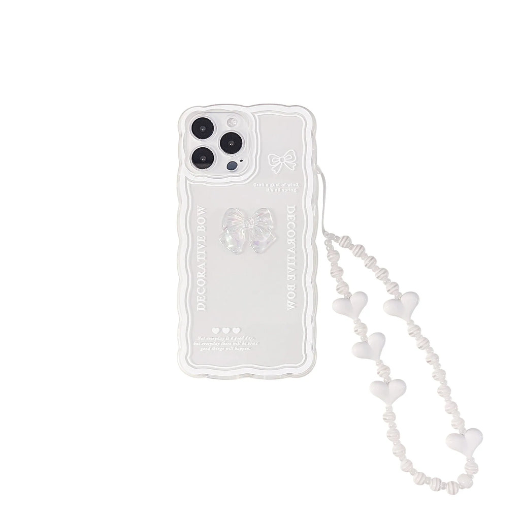 Transparent iPhone case with a three-dimensional ice-through bow decoration on the back.