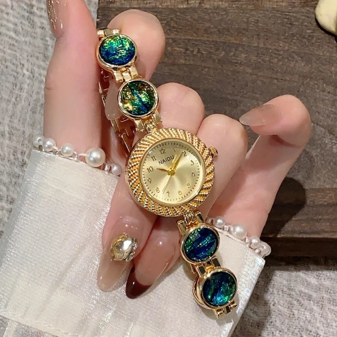 Women's quartz watch with 25mm round dial in zinc alloy case showing spiral crown and colour options