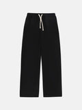 Men's black fleece-lined sweatpants with an elastic drawstring waistband shown in a loose fit.