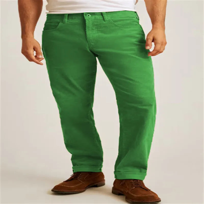 Green corduroy loose straight-leg casual trousers laid flat, showing mid-waist and zip fly detail.