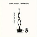 Black aluminium desk lamp with touch dimming controls and three-colour lighting options