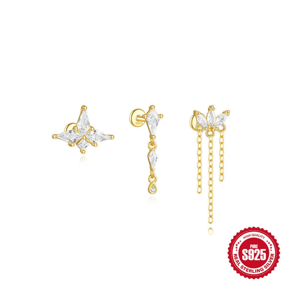 S925 sterling silver geometric kite shaped earring with a chain tassel and rhinestones in a gold colour.