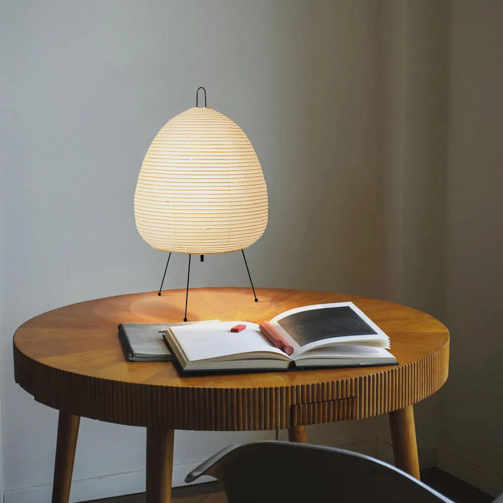Japanese style rice paper table lamp with handmade shade on aluminium base showing three-tone dimming button