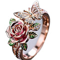 Adjustable oil drop butterfly ring with rose and floral design in alloy metal