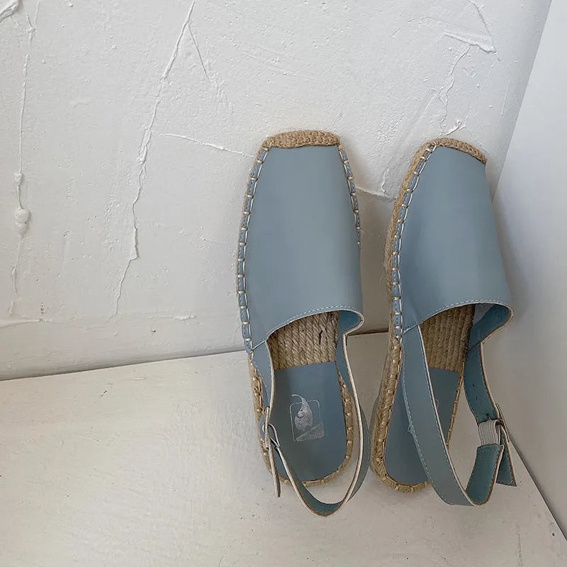 Women's Baotou retro fisherman flat sandals in canvas and soft leather.