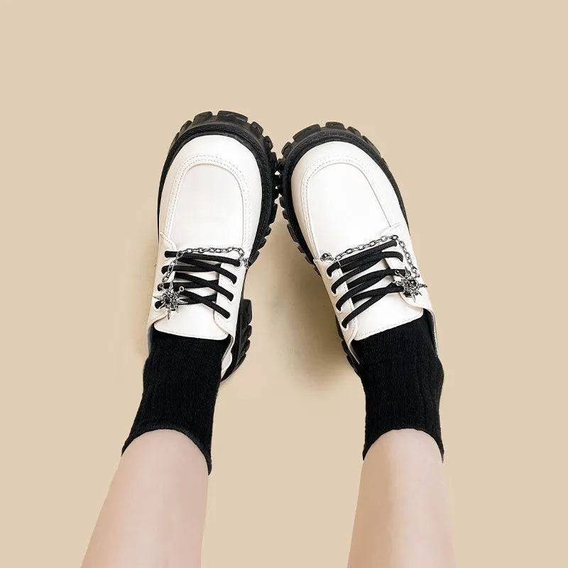 Women's preppy style loafers in Duke Asterism colour with metal buckle strap