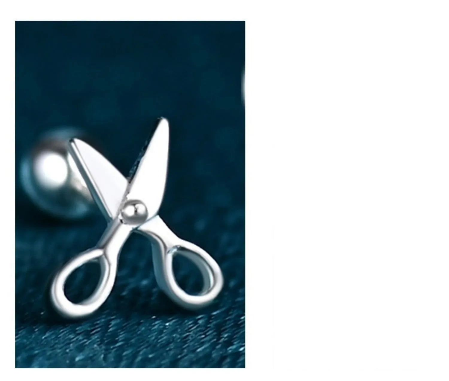 A pair of S999 pure silver screw ear nails with a mini scissors motif.