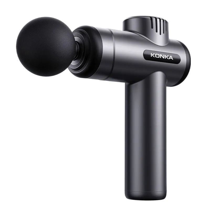 Konka V19 professional mini massage gun with multiple interchangeable massage heads on a table.