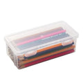 Transparent plastic stationery storage box containing pencils and coloured art supplies