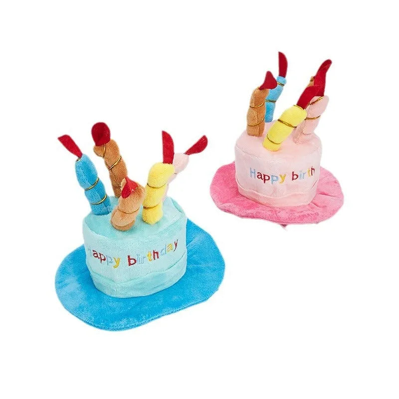 Blue and pink coloured toy birthday hat for dogs on a white background.