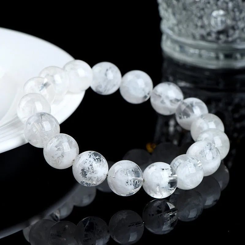 Women's geometric crystal bracelet with natural blizzard snowflake round beads in 5A or 6A colour variations