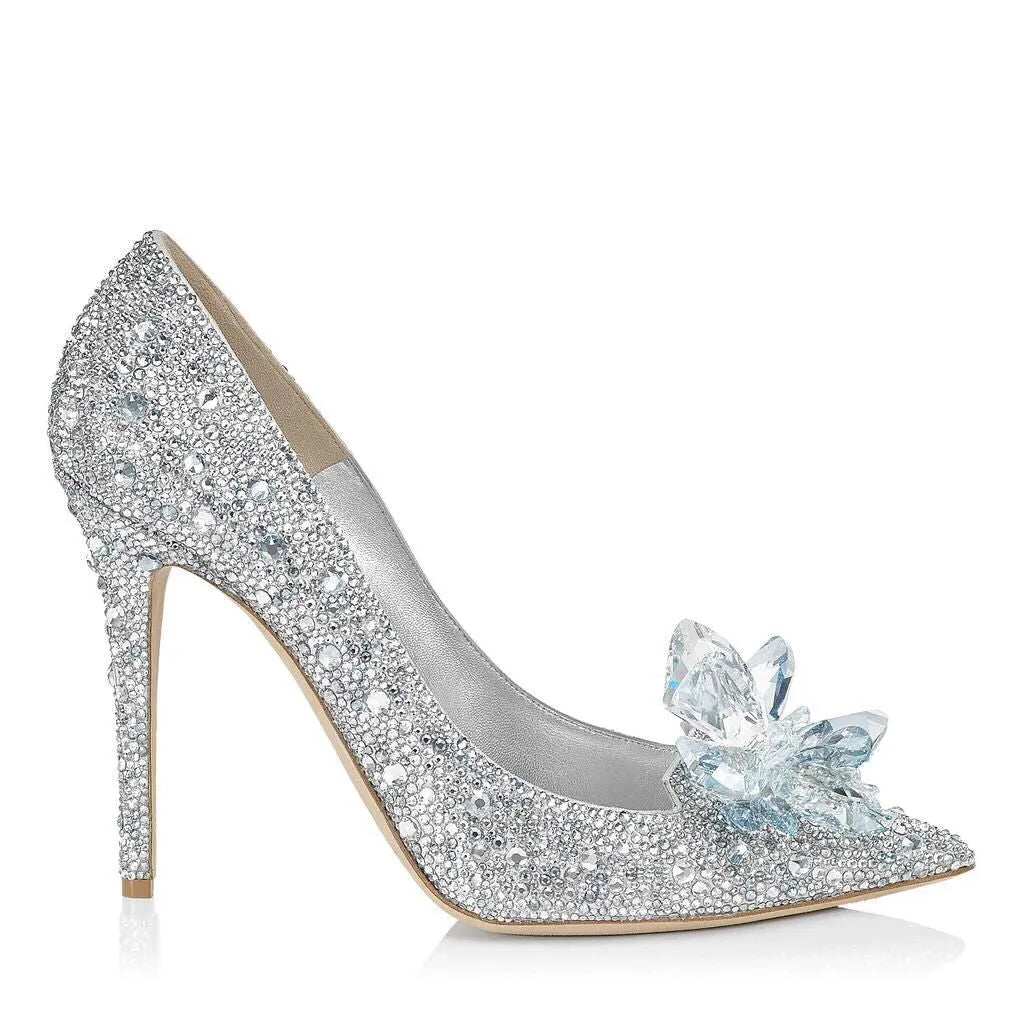 Women's gold pointed toe high heels with rhinestone details and stiletto heel