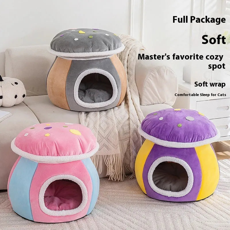 Grey mushroom-shaped plush cat bed on a wooden floor.