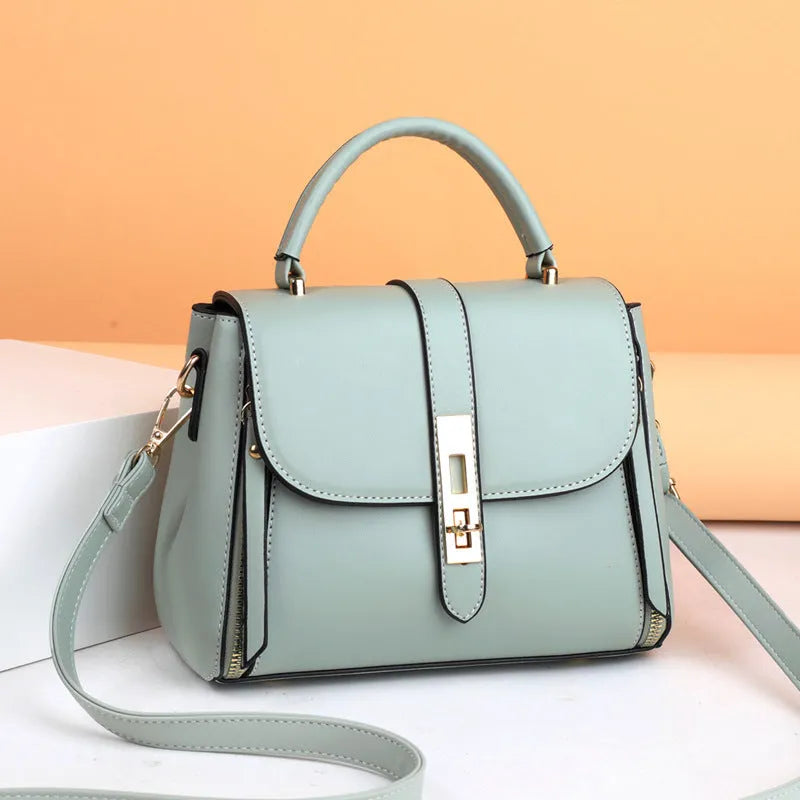 Women's soft leather messenger bag in black red green blue colours square vertical design